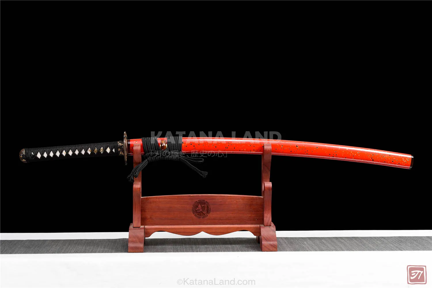 Red samurai katana featuring Hamon