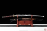 Black samurai katana featuring Hamon