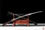 Elegant black katana with unique Hamon pattern