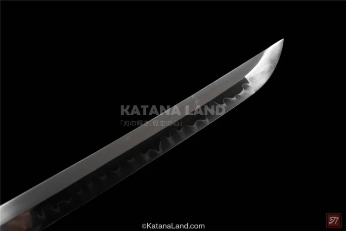 Elegant red katana with intricate Hamon detail