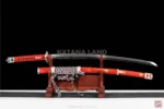 Red katana sword featuring Hamon design