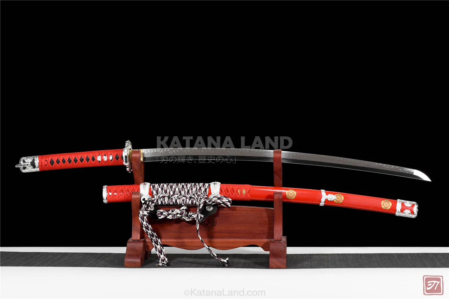 Red katana sword featuring Hamon design