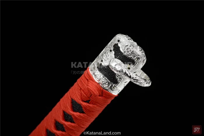 Traditional samurai katana sword with red finish and Hamon