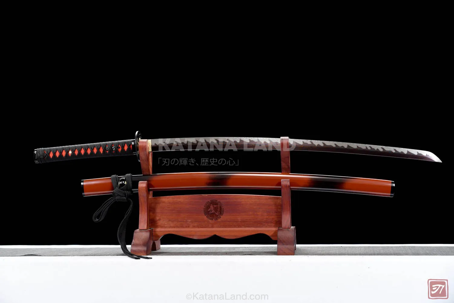 Red samurai katana featuring unique hamon