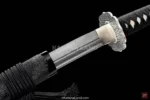 Unique black Kōun Katana with artistic Hamon