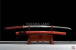 Red samurai katana featuring Hamon