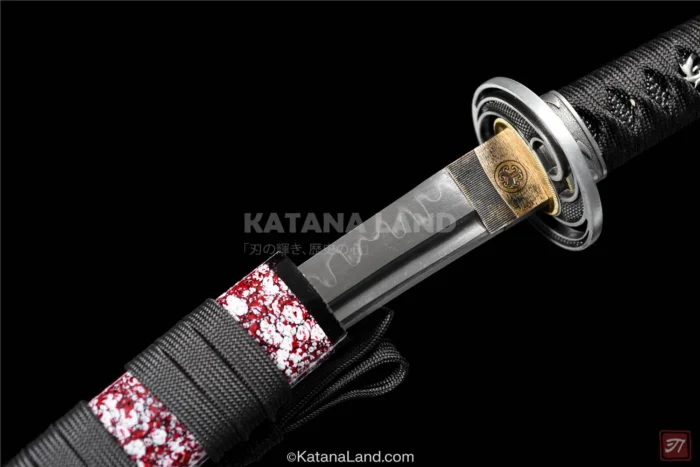 Decorative katana sword featuring red color and Hamon