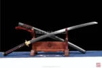 Elegant black katana with traditional Hamon pattern