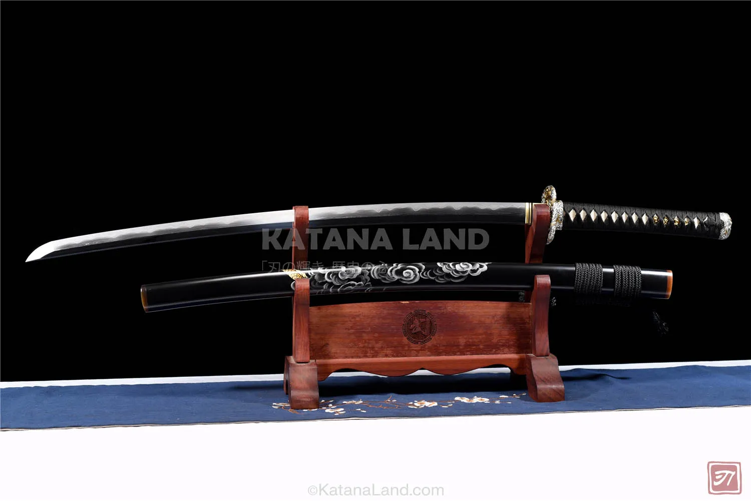 Black katana sword featuring unique hamon pattern