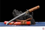 Red katana sword featuring beautiful Hamon