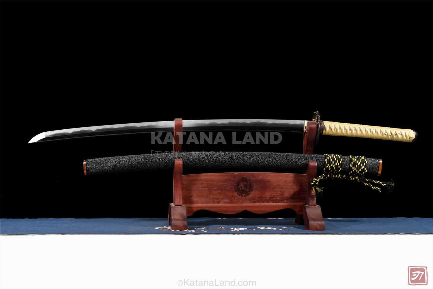 Black katana sword featuring unique hamon