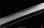 Elegant Black Katana with Unique Hamon Pattern