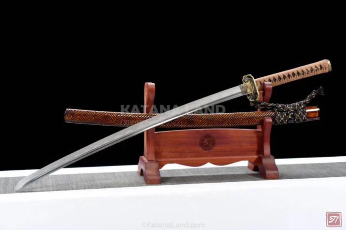 Red katana sword featuring BO-HI and Hamon