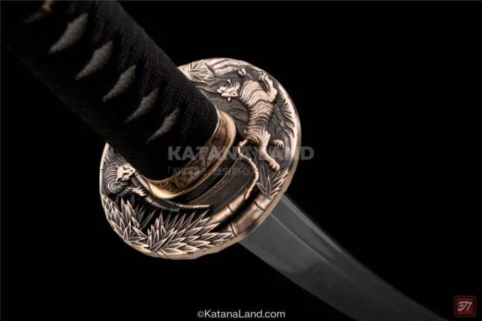 Black katana with traditional Hamon pattern