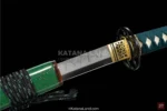 Artisan-crafted katana swords with striking green hues